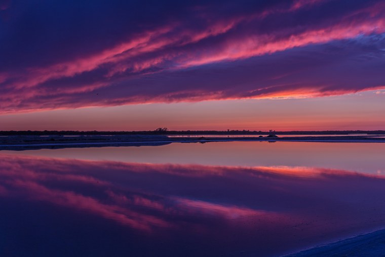 Закат от голубого до красного