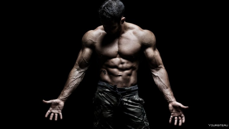 Мужское тело на черном фоне