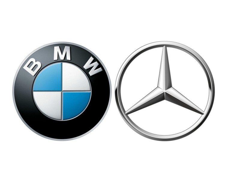 Значок Mercedes и значок BMW