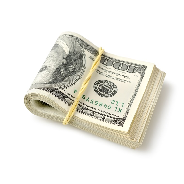 Пачки денег доллары