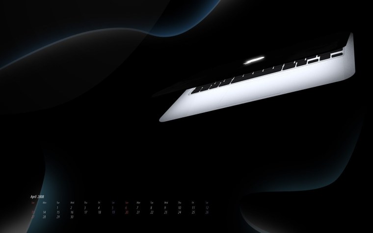 MACBOOK на темном фоне