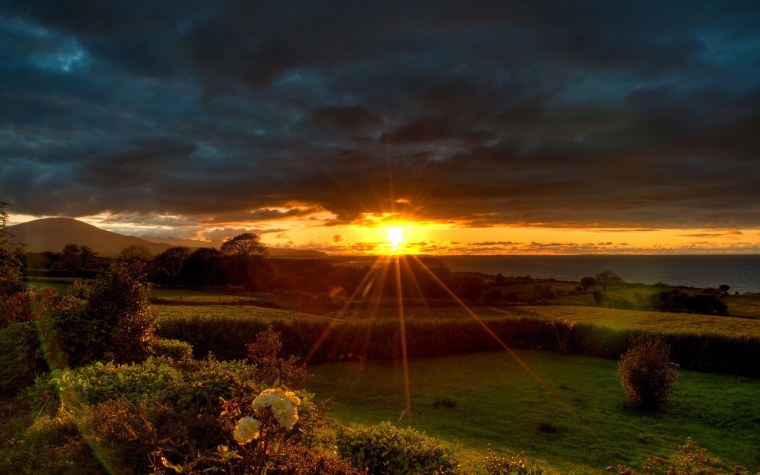 Лучи восходящего солнца