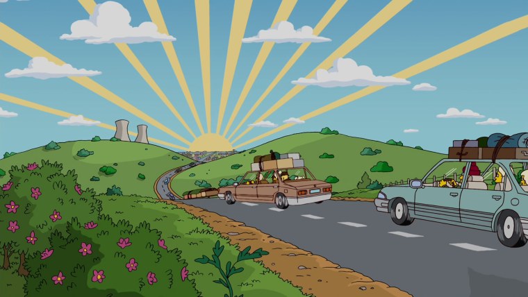 Гомер симпсон сидит на машине