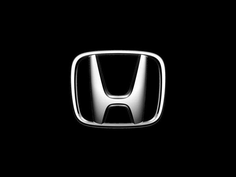 Honda значок на черном фоне