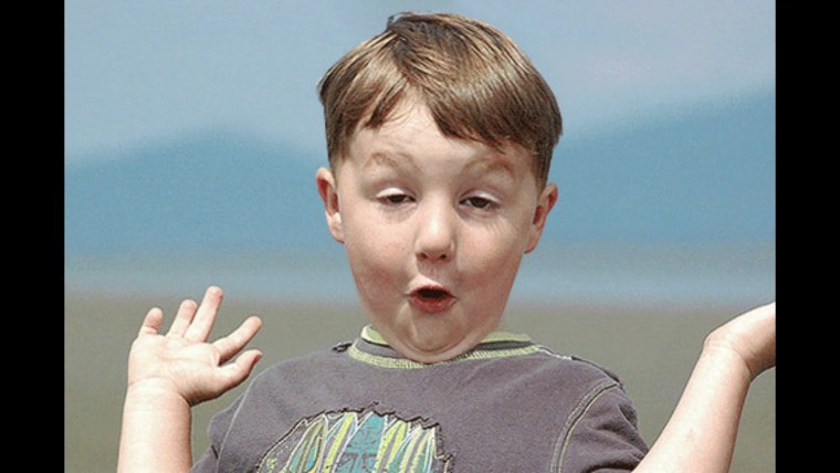 Рыжий удивленный мальчик