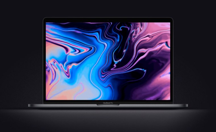MACBOOK Pro на темном фоне