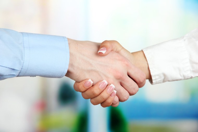 Рукопожатие на белом фоне