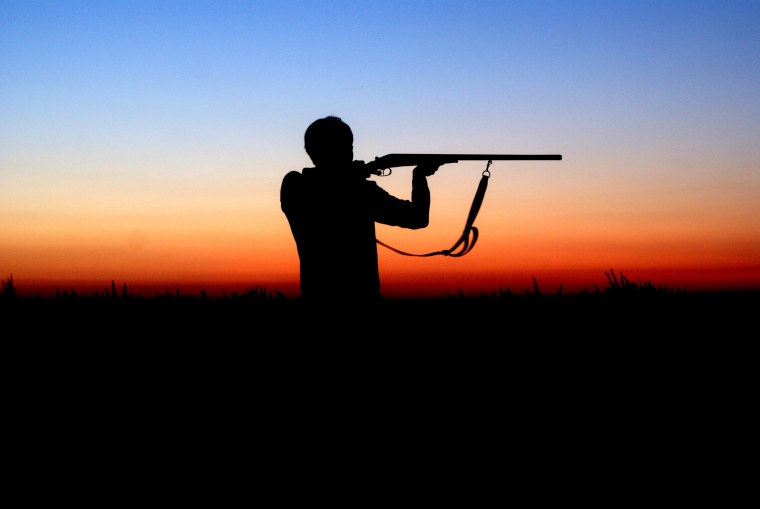 Парень с винтовкой