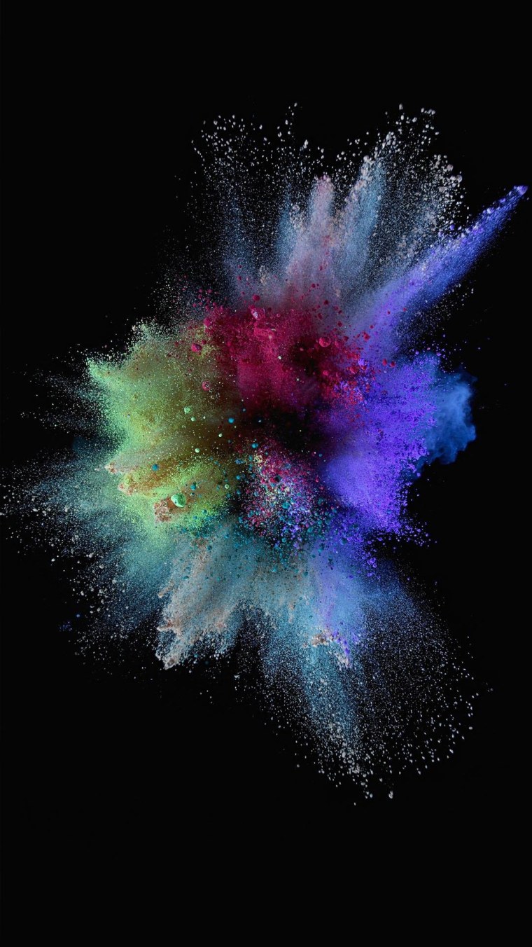 Взрыв красок на черном фоне