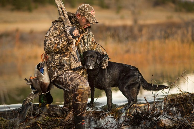 Охотник с собачкой
