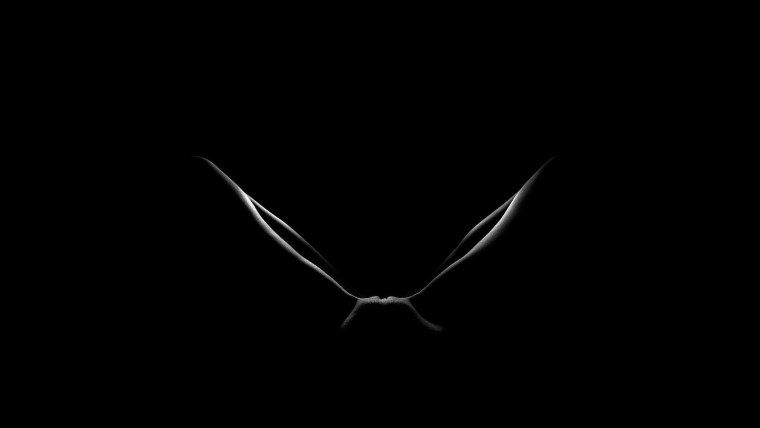 Значок Apple на черном фоне