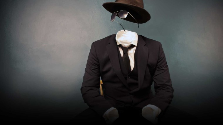 Мужчина в черной шляпе