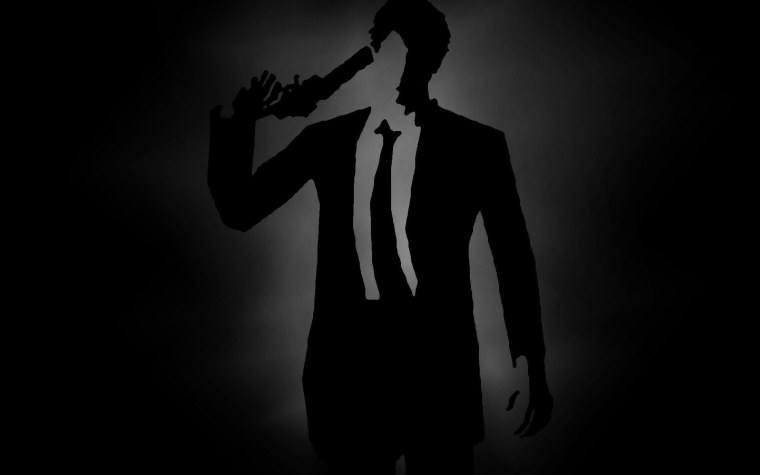 Мужчина в костюме с часами