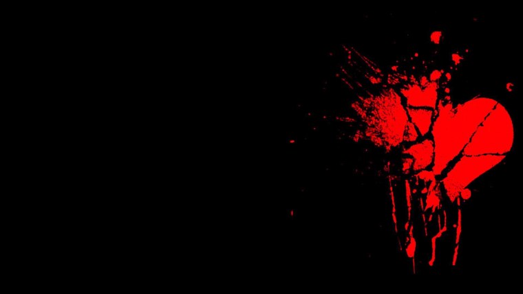 Грустный смайлик на чёрном фоне с разбитым сердцем