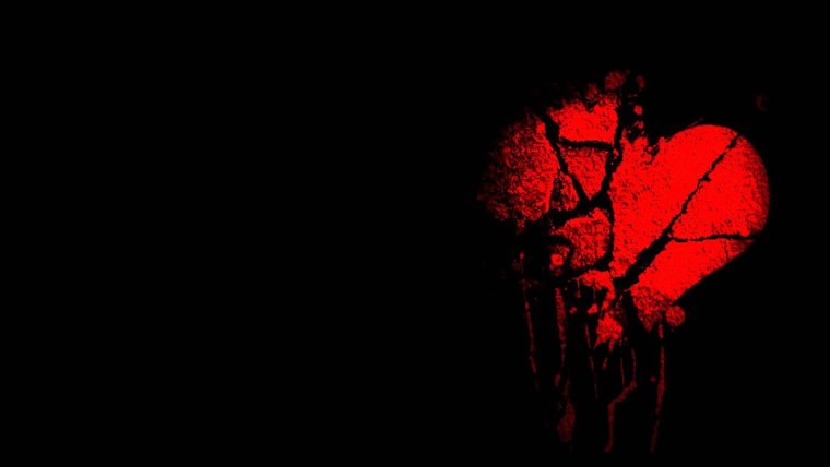 Разбитые сердца на черном фоне