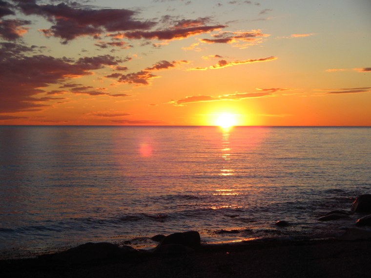 Красивый закат на море Естественные