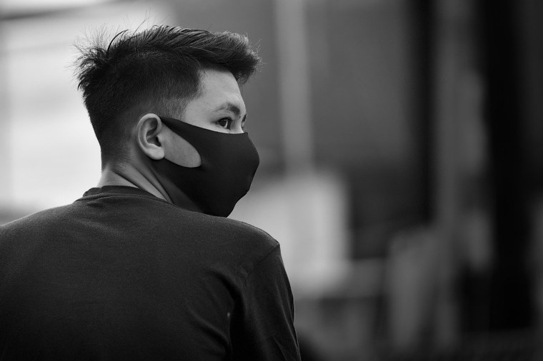 Человек в маске