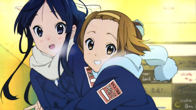 Мио Акияма и Рицу Тайнака