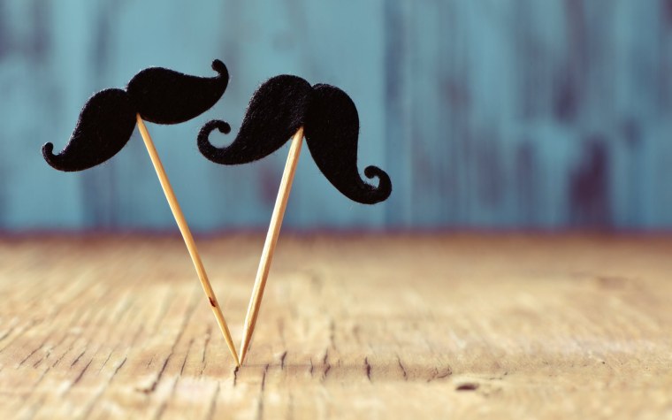 Усы мужчины на палочке