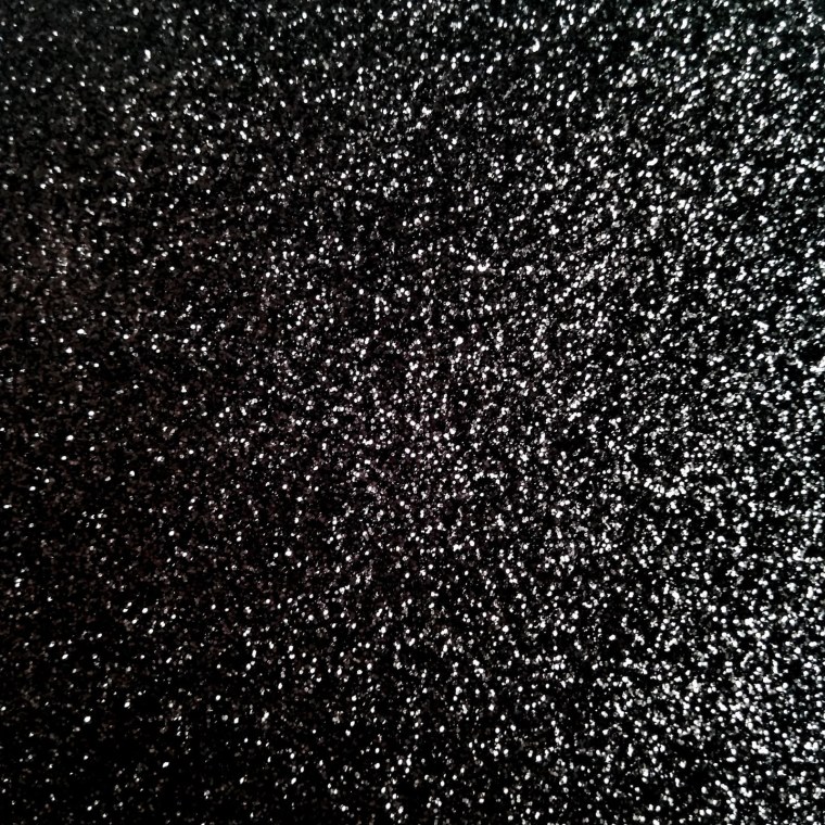 Блестки на черном фоне