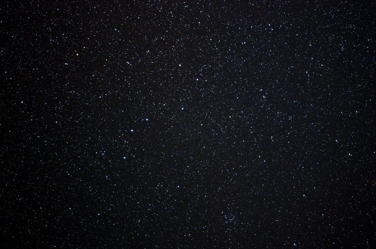 Темное небо со звездами