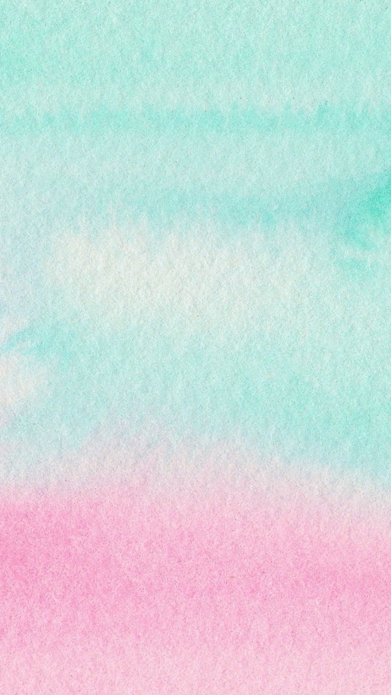 Леденец на палочке на розовом фоне