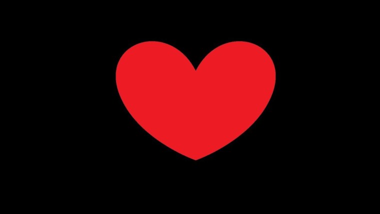 Красное сердце на черном фоне