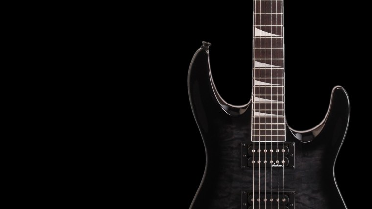 Электрогитара на черном фоне