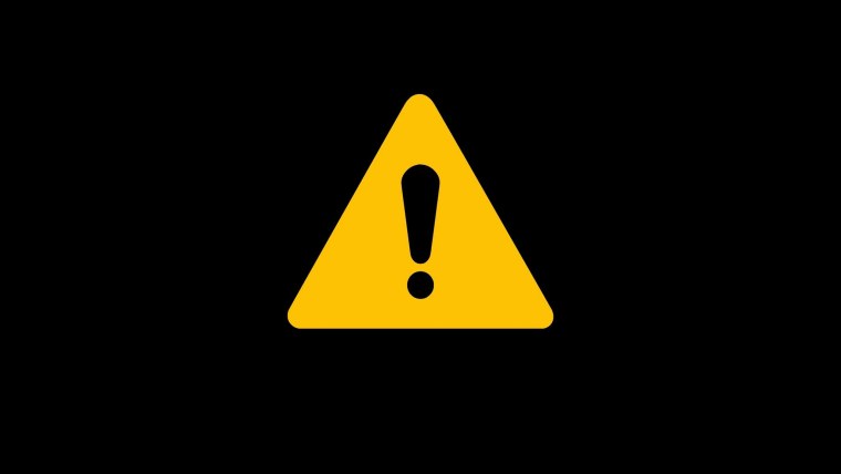 Желтый треугольник с восклицательным знаком