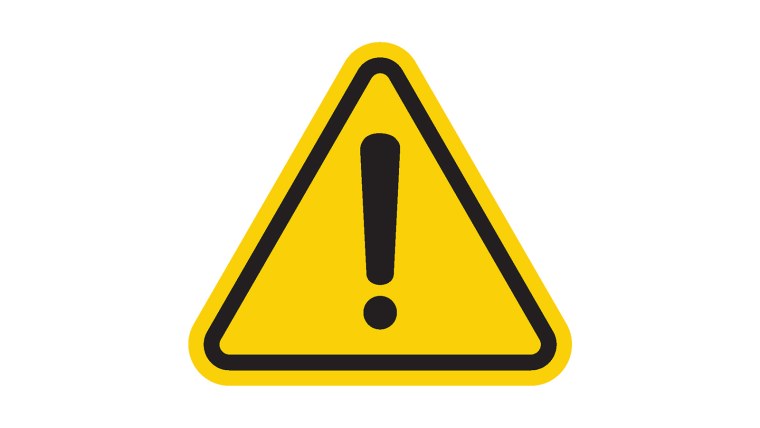 Желтый треугольный знак