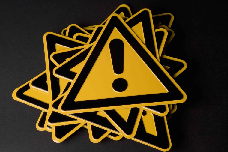 Желтый треугольник с восклицательным знаком