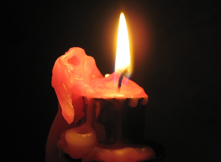 Горящая свеча