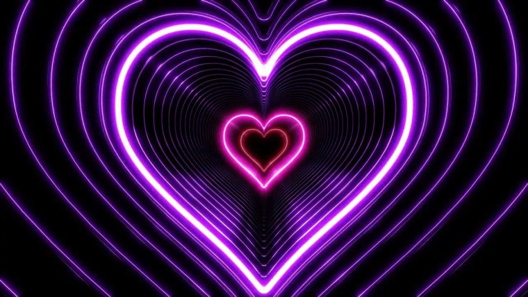 Неоновые сердечки на черном фоне