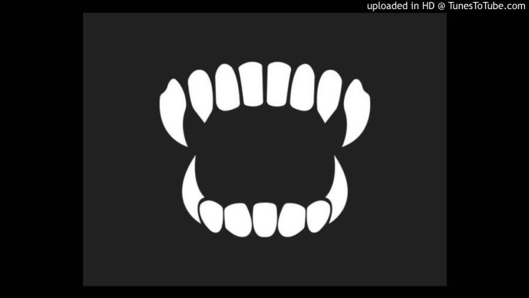 Зубы на черном фоне