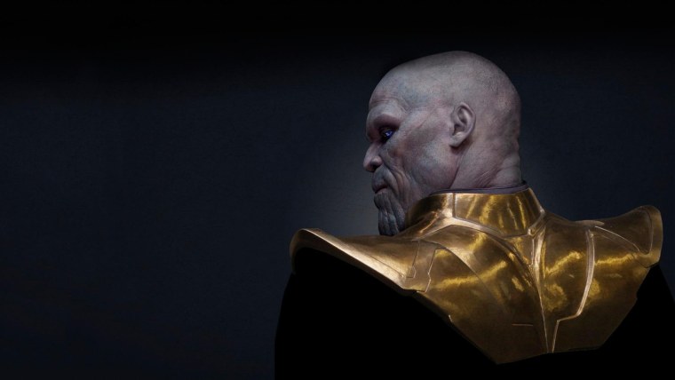 Танос Марвел