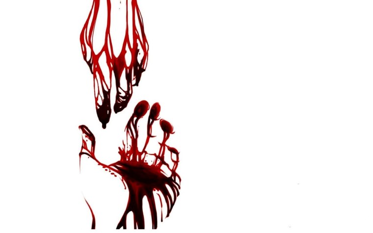 Капля крови на черном фоне