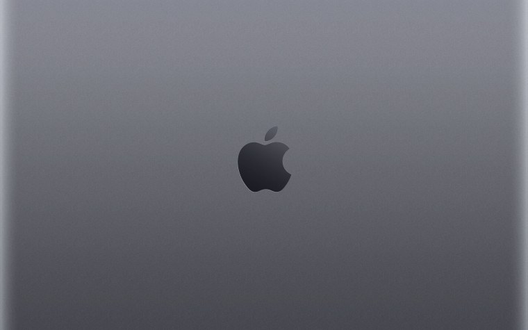 Макбук на черном фоне