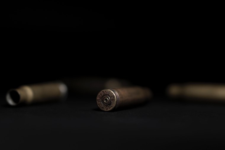 Гильзы на черном фоне