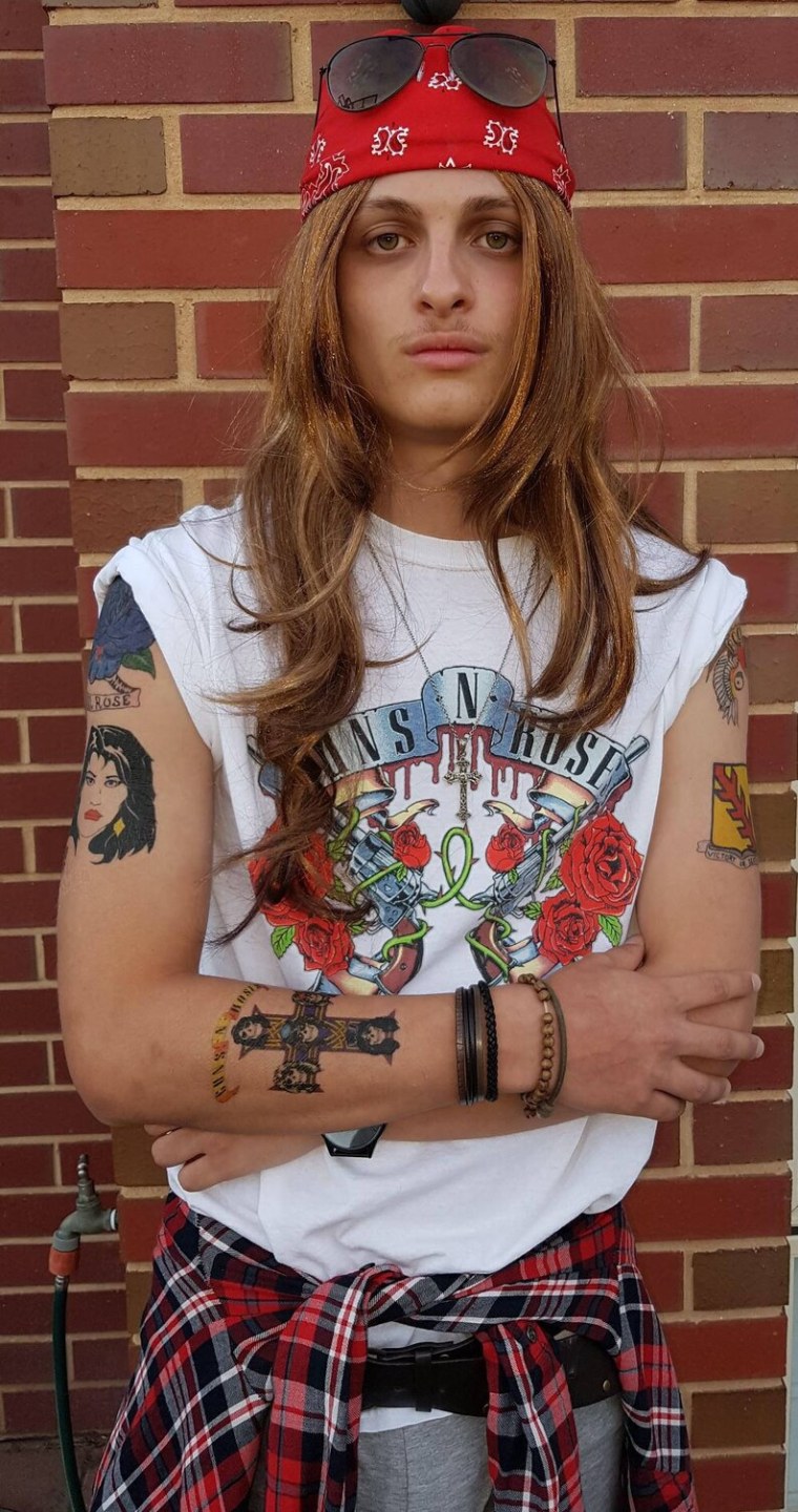 Эксл Роуз тату