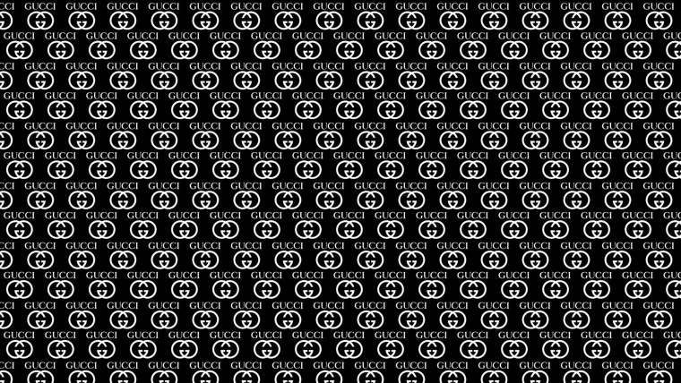 Логотип гуччи на черном фоне