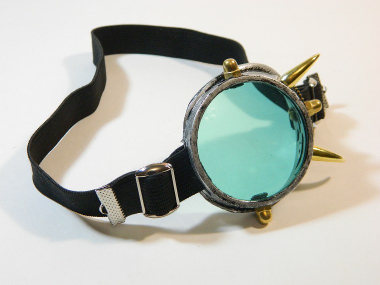 Эркюль Пуаро монокль