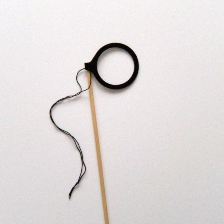 Монокль на палочке