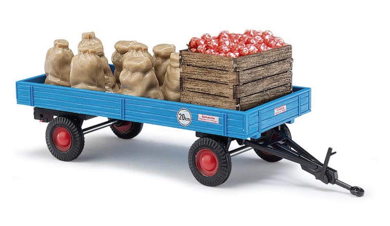 Трактор с прицепом продуктов