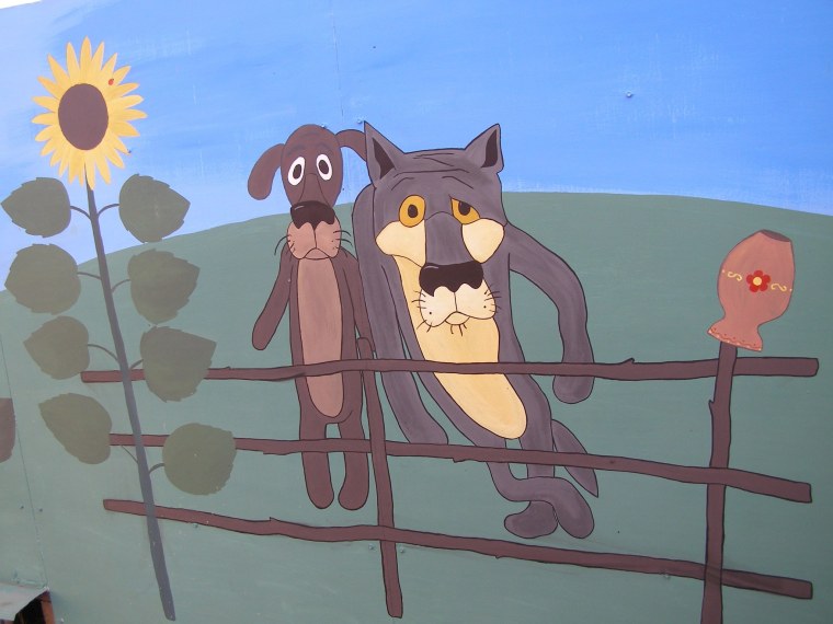 Рисунки собак на заборе