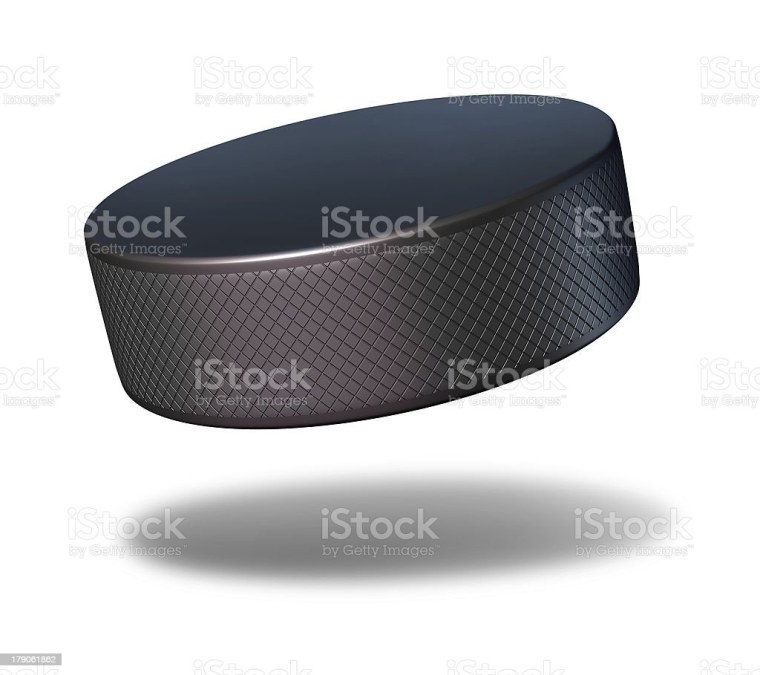 Хоккейная шайба на белом фоне