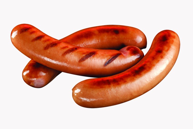 Сосиски гриль на белом фоне