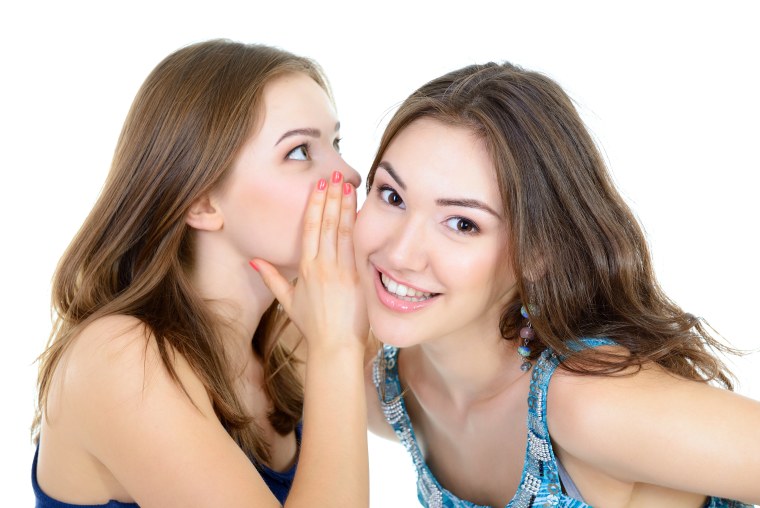 Девушка шепчет