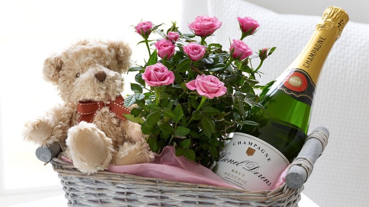 Цветы шампанское конфеты