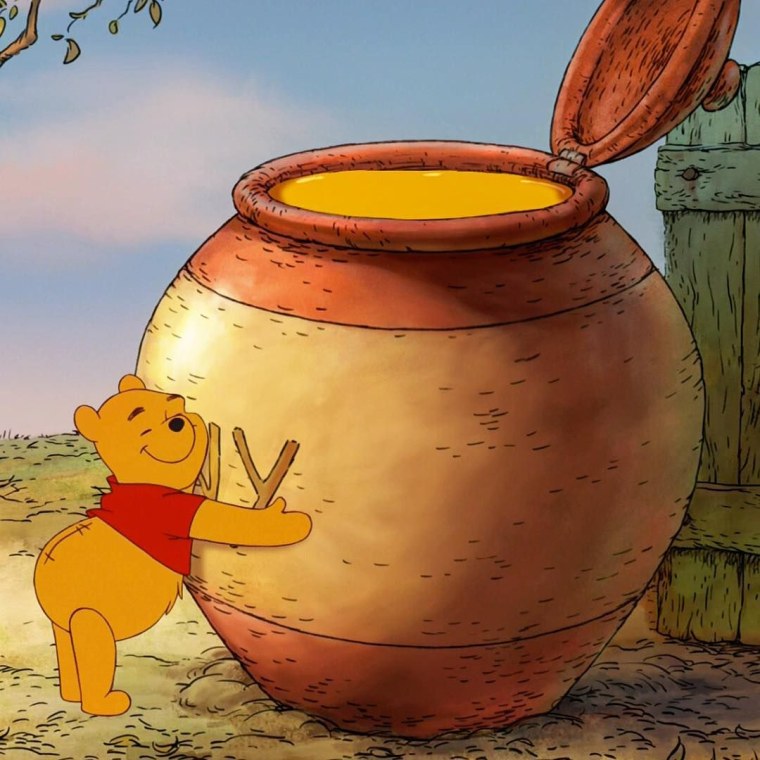 Винни пух с бочкой меда