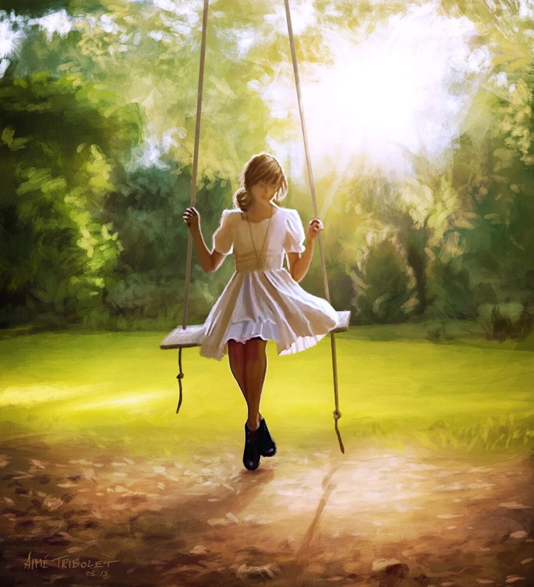 Девочка катается на качелях